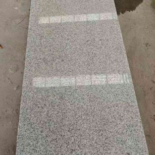 广安芝麻白光面毛板